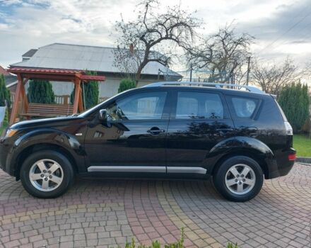 Черный Мицубиси Аутлендер, объемом двигателя 2 л и пробегом 249 тыс. км за 8750 $, фото 3 на Automoto.ua