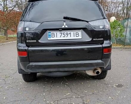 Чорний Міцубісі Аутлендер, об'ємом двигуна 2.36 л та пробігом 265 тис. км за 8800 $, фото 17 на Automoto.ua