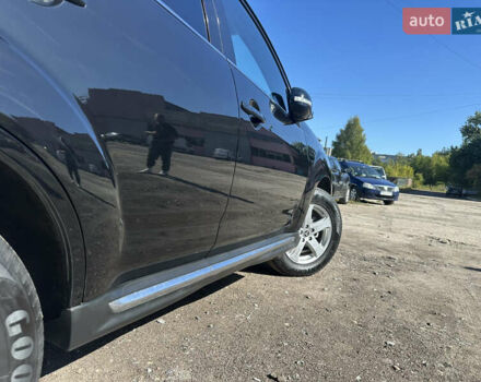 Черный Мицубиси Аутлендер, объемом двигателя 2 л и пробегом 240 тыс. км за 10999 $, фото 18 на Automoto.ua