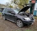 Чорний Міцубісі Аутлендер, об'ємом двигуна 2.38 л та пробігом 149 тис. км за 8800 $, фото 4 на Automoto.ua