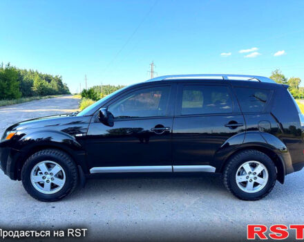 Чорний Міцубісі Аутлендер, об'ємом двигуна 2.4 л та пробігом 171 тис. км за 8999 $, фото 4 на Automoto.ua