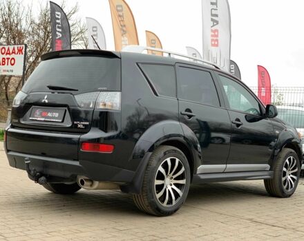 Черный Мицубиси Аутлендер, объемом двигателя 2.4 л и пробегом 175 тыс. км за 10499 $, фото 4 на Automoto.ua