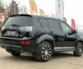 Черный Мицубиси Аутлендер, объемом двигателя 2.4 л и пробегом 175 тыс. км за 10499 $, фото 4 на Automoto.ua