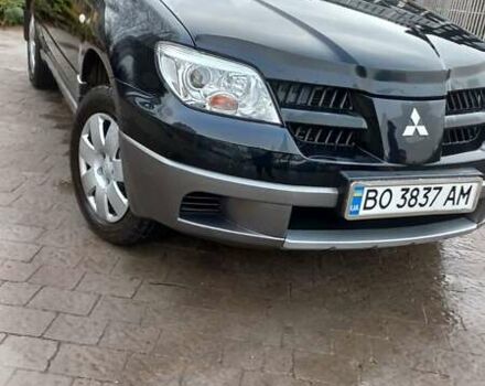 Черный Мицубиси Аутлендер, объемом двигателя 2 л и пробегом 73 тыс. км за 9500 $, фото 14 на Automoto.ua