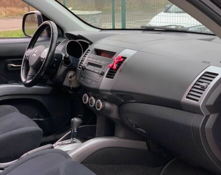 Черный Мицубиси Аутлендер, объемом двигателя 2.4 л и пробегом 175 тыс. км за 10499 $, фото 14 на Automoto.ua