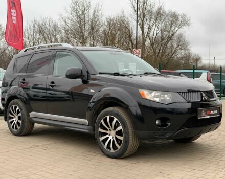 Черный Мицубиси Аутлендер, объемом двигателя 2.4 л и пробегом 175 тыс. км за 10499 $, фото 2 на Automoto.ua