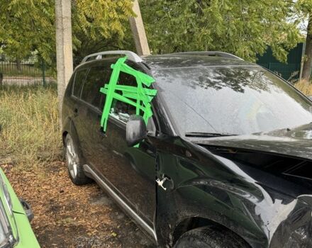 Черный Мицубиси Аутлендер, объемом двигателя 2.4 л и пробегом 246 тыс. км за 2600 $, фото 6 на Automoto.ua