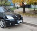 Черный Мицубиси Аутлендер, объемом двигателя 2 л и пробегом 175 тыс. км за 8500 $, фото 15 на Automoto.ua