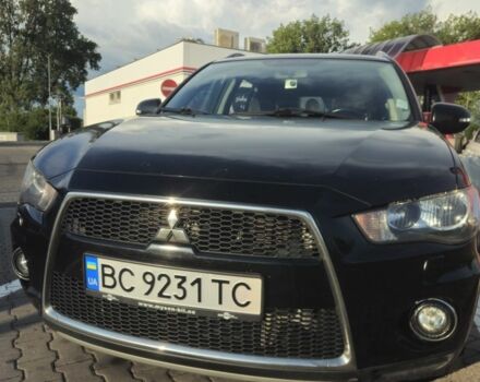 Чорний Міцубісі Аутлендер, об'ємом двигуна 2 л та пробігом 310 тис. км за 9800 $, фото 1 на Automoto.ua