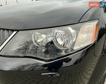 Черный Мицубиси Аутлендер, объемом двигателя 3 л и пробегом 77 тыс. км за 11800 $, фото 26 на Automoto.ua