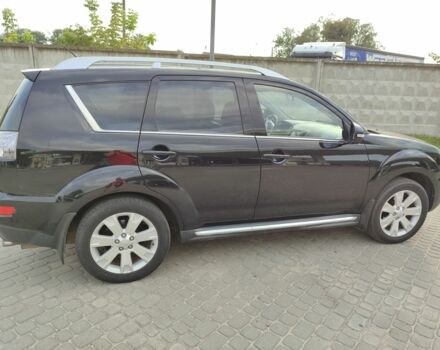 Черный Мицубиси Аутлендер, объемом двигателя 2 л и пробегом 104 тыс. км за 9900 $, фото 6 на Automoto.ua