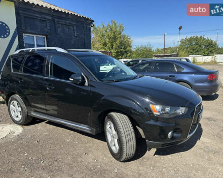 Черный Мицубиси Аутлендер, объемом двигателя 2 л и пробегом 240 тыс. км за 10999 $, фото 16 на Automoto.ua
