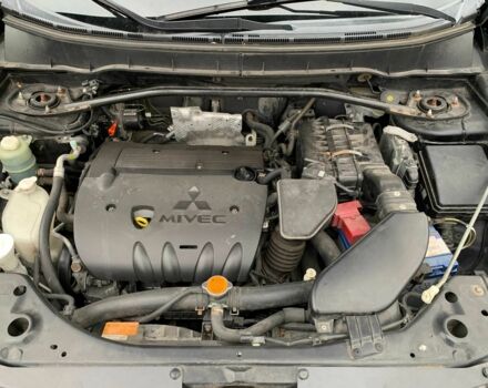 Черный Мицубиси Аутлендер, объемом двигателя 2.4 л и пробегом 175 тыс. км за 10499 $, фото 20 на Automoto.ua