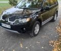 Міцубісі Аутлендер 2009 у Хмельницькому на Automoto.ua Чорний Міцубісі Аутлендер, об'ємом двигуна 2.4 л та пробігом 157 тис. км за 8500 $, фото 4 на Automoto.ua