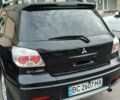 Черный Мицубиси Аутлендер, объемом двигателя 2 л и пробегом 175 тыс. км за 8500 $, фото 12 на Automoto.ua
