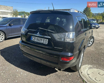 Черный Мицубиси Аутлендер, объемом двигателя 2 л и пробегом 240 тыс. км за 10999 $, фото 9 на Automoto.ua