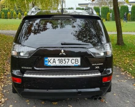 Міцубісі Аутлендер 2009 у Хмельницькому на Automoto.ua Чорний Міцубісі Аутлендер, об'ємом двигуна 2.4 л та пробігом 157 тис. км за 8500 $, фото 8 на Automoto.ua