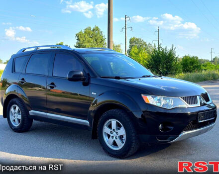 Чорний Міцубісі Аутлендер, об'ємом двигуна 2.4 л та пробігом 171 тис. км за 8999 $, фото 1 на Automoto.ua