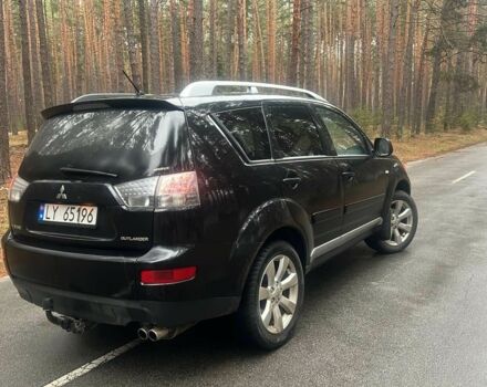 Черный Мицубиси Аутлендер, объемом двигателя 2 л и пробегом 280 тыс. км за 4500 $, фото 4 на Automoto.ua