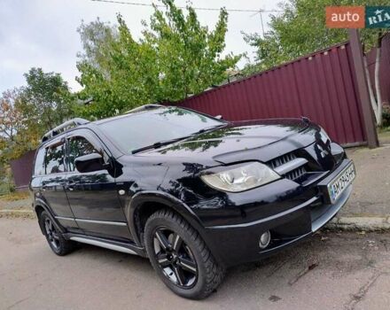 Черный Мицубиси Аутлендер, объемом двигателя 2 л и пробегом 223 тыс. км за 7200 $, фото 2 на Automoto.ua