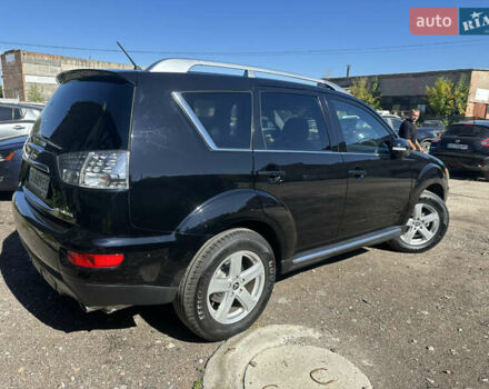 Черный Мицубиси Аутлендер, объемом двигателя 2 л и пробегом 240 тыс. км за 10999 $, фото 12 на Automoto.ua