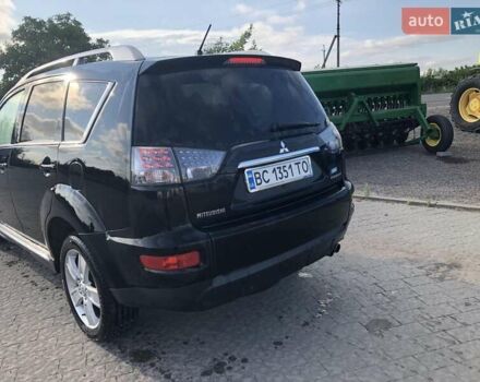 Чорний Міцубісі Аутлендер, об'ємом двигуна 2 л та пробігом 214 тис. км за 10700 $, фото 7 на Automoto.ua