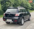 Чорний Міцубісі Аутлендер, об'ємом двигуна 2 л та пробігом 79 тис. км за 9500 $, фото 12 на Automoto.ua
