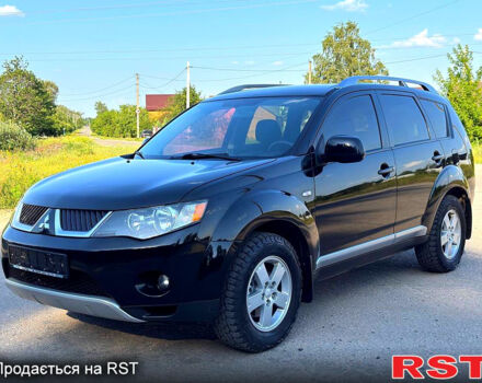 Чорний Міцубісі Аутлендер, об'ємом двигуна 2.4 л та пробігом 171 тис. км за 8999 $, фото 2 на Automoto.ua