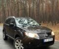 Черный Мицубиси Аутлендер, объемом двигателя 2 л и пробегом 280 тыс. км за 4500 $, фото 1 на Automoto.ua
