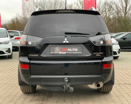 Черный Мицубиси Аутлендер, объемом двигателя 2.4 л и пробегом 175 тыс. км за 10499 $, фото 5 на Automoto.ua