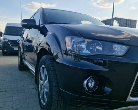 Чорний Міцубісі Аутлендер, об'ємом двигуна 2 л та пробігом 310 тис. км за 9800 $, фото 4 на Automoto.ua