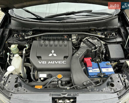 Черный Мицубиси Аутлендер, объемом двигателя 3 л и пробегом 77 тыс. км за 11800 $, фото 25 на Automoto.ua