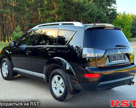 Чорний Міцубісі Аутлендер, об'ємом двигуна 2.4 л та пробігом 171 тис. км за 8999 $, фото 5 на Automoto.ua