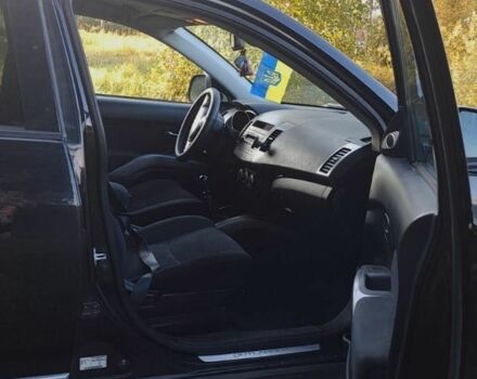 Чорний Міцубісі Аутлендер, об'ємом двигуна 2 л та пробігом 259 тис. км за 3900 $, фото 4 на Automoto.ua