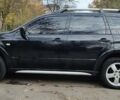 Черный Мицубиси Аутлендер, объемом двигателя 2 л и пробегом 175 тыс. км за 8500 $, фото 1 на Automoto.ua