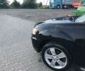 Чорний Міцубісі Аутлендер, об'ємом двигуна 2 л та пробігом 214 тис. км за 10700 $, фото 5 на Automoto.ua