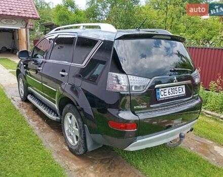 Черный Мицубиси Аутлендер, объемом двигателя 2.2 л и пробегом 279 тыс. км за 11000 $, фото 1 на Automoto.ua