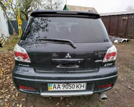 Черный Мицубиси Аутлендер, объемом двигателя 2.4 л и пробегом 149 тыс. км за 8800 $, фото 3 на Automoto.ua