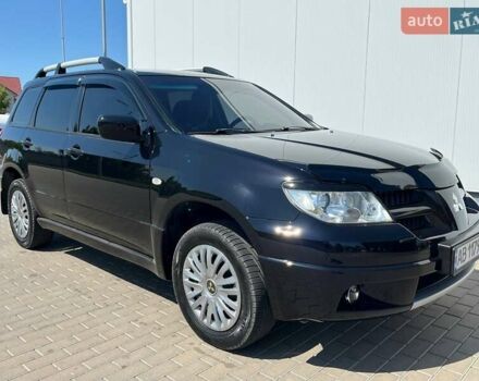 Черный Мицубиси Аутлендер, объемом двигателя 2 л и пробегом 236 тыс. км за 6699 $, фото 8 на Automoto.ua