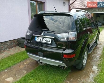Черный Мицубиси Аутлендер, объемом двигателя 2.2 л и пробегом 279 тыс. км за 11000 $, фото 3 на Automoto.ua