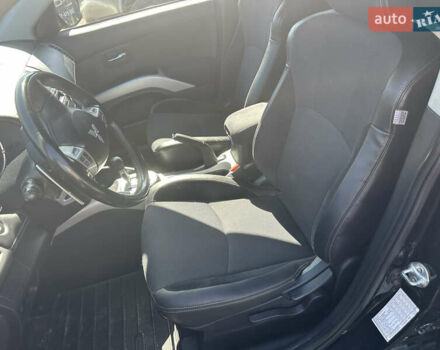 Черный Мицубиси Аутлендер, объемом двигателя 2 л и пробегом 240 тыс. км за 10999 $, фото 21 на Automoto.ua