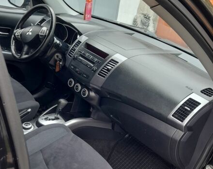 Міцубісі Аутлендер 2009 у Хмельницькому на Automoto.ua Чорний Міцубісі Аутлендер, об'ємом двигуна 2.4 л та пробігом 157 тис. км за 8500 $, фото 15 на Automoto.ua