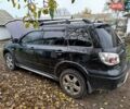 Чорний Міцубісі Аутлендер, об'ємом двигуна 2.38 л та пробігом 149 тис. км за 8800 $, фото 2 на Automoto.ua