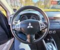 Міцубісі Аутлендер 2009 у Житомирі на Automoto.ua Чорний Міцубісі Аутлендер, об'ємом двигуна 2 л та пробігом 251 тис. км за 8400 $, фото 12 на Automoto.ua