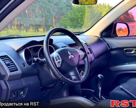 Чорний Міцубісі Аутлендер, об'ємом двигуна 2.4 л та пробігом 171 тис. км за 8999 $, фото 7 на Automoto.ua