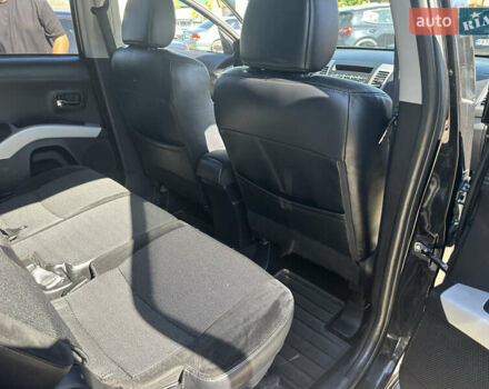 Черный Мицубиси Аутлендер, объемом двигателя 2 л и пробегом 240 тыс. км за 10999 $, фото 33 на Automoto.ua