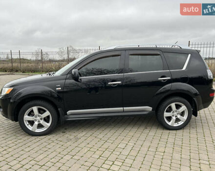 Черный Мицубиси Аутлендер, объемом двигателя 3 л и пробегом 77 тыс. км за 11800 $, фото 5 на Automoto.ua