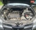 Черный Мицубиси Аутлендер, объемом двигателя 2 л и пробегом 118 тыс. км за 7600 $, фото 17 на Automoto.ua