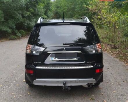 Чорний Міцубісі Аутлендер, об'ємом двигуна 2 л та пробігом 220 тис. км за 10700 $, фото 4 на Automoto.ua