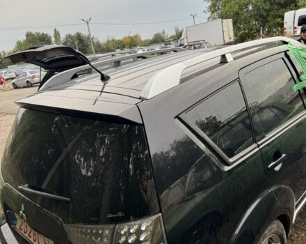 Черный Мицубиси Аутлендер, объемом двигателя 2.4 л и пробегом 246 тыс. км за 2600 $, фото 1 на Automoto.ua